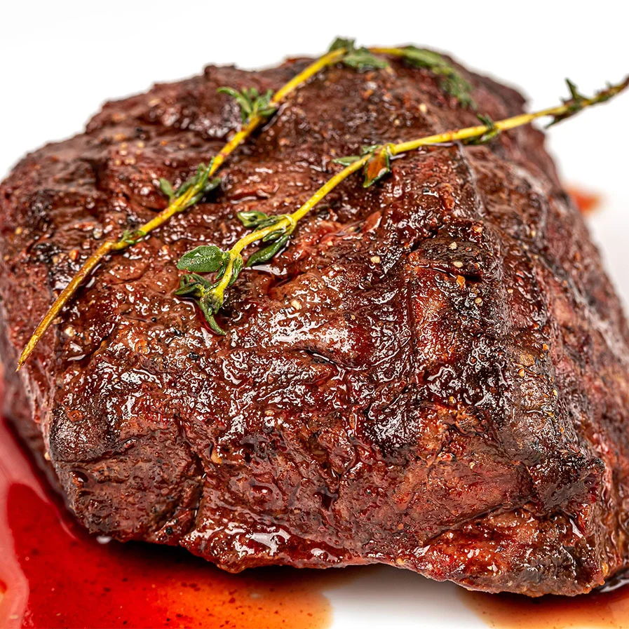 Filet Mignon with sprig of thyme by Marco Verch